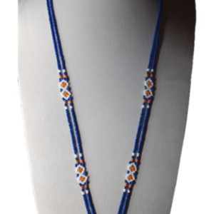 White vinusak with blue and orange necklace