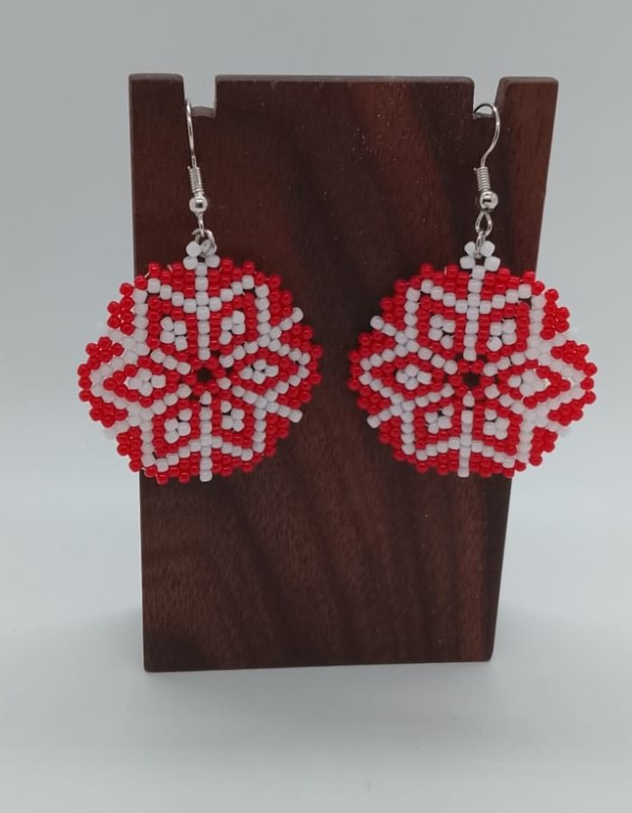 White snowflake on a red backdrop